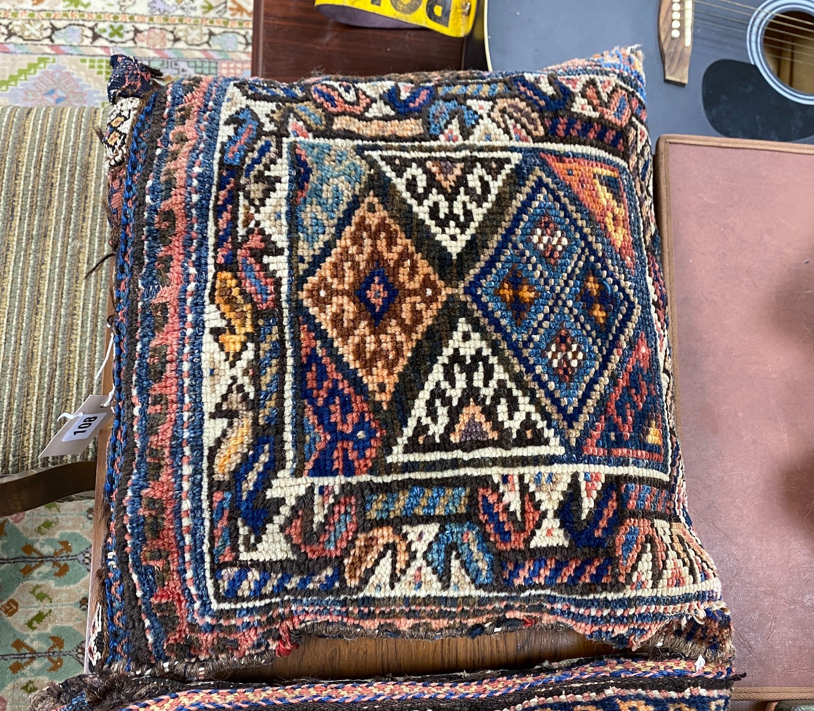 Three Persian salt bags made into cushions